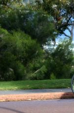 KATY PERRY in Tights Riding a Bicycle Out in Perth