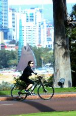 KATY PERRY in Tights Riding a Bicycle Out in Perth