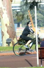 KATY PERRY in Tights Riding a Bicycle Out in Perth