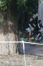 KATY PERRY in Tights Riding a Bicycle Out in Perth