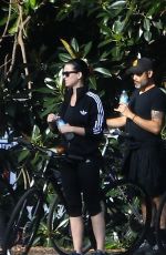 KATY PERRY in Tights Riding a Bicycle Out in Perth