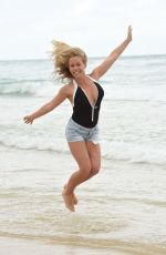 KENDRA WILKINSON in Swimsuit at a Phostoshoot on the Beach in Queensland