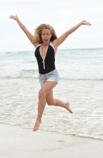 KENDRA WILKINSON in Swimsuit at a Phostoshoot on the Beach in Queensland