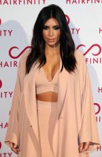 KIM and KHLOE KARDASHIAN at Hairfinity UK Launch Party in London