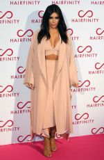 KIM and KHLOE KARDASHIAN at Hairfinity UK Launch Party in London