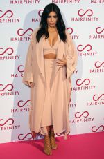 KIM and KHLOE KARDASHIAN at Hairfinity UK Launch Party in London