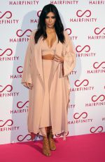 KIM and KHLOE KARDASHIAN at Hairfinity UK Launch Party in London