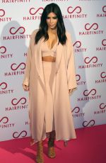 KIM and KHLOE KARDASHIAN at Hairfinity UK Launch Party in London