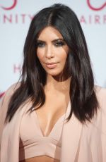 KIM and KHLOE KARDASHIAN at Hairfinity UK Launch Party in London