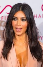 KIM and KHLOE KARDASHIAN at Hairfinity UK Launch Party in London