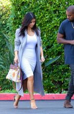KIM KARDASHIAN and Kanye West Arrives at Jenner cCommunications in Woodland Hills