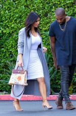 KIM KARDASHIAN and Kanye West Arrives at Jenner cCommunications in Woodland Hills