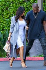 KIM KARDASHIAN and Kanye West Arrives at Jenner cCommunications in Woodland Hills