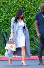 KIM KARDASHIAN and Kanye West Arrives at Jenner cCommunications in Woodland Hills