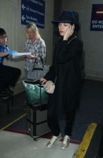 MARION COTILLARD Arrives at Los Angeles International Airport 0611
