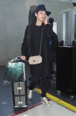 MARION COTILLARD Arrives at Los Angeles International Airport 0611