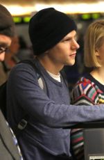 MIA WASIKOWSKA and Jesse Eisenberg Arrives at LAX Airport in Los Angeles