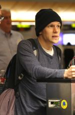 MIA WASIKOWSKA and Jesse Eisenberg Arrives at LAX Airport in Los Angeles