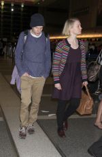 MIA WASIKOWSKA and Jesse Eisenberg Arrives at LAX Airport in Los Angeles