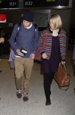 MIA WASIKOWSKA and Jesse Eisenberg Arrives at LAX Airport in Los Angeles