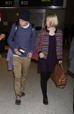 MIA WASIKOWSKA and Jesse Eisenberg Arrives at LAX Airport in Los Angeles