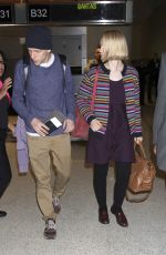 MIA WASIKOWSKA and Jesse Eisenberg Arrives at LAX Airport in Los Angeles
