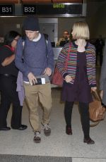 MIA WASIKOWSKA and Jesse Eisenberg Arrives at LAX Airport in Los Angeles
