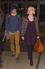 MIA WASIKOWSKA and Jesse Eisenberg Arrives at LAX Airport in Los Angeles