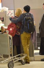 MIA WASIKOWSKA and Jesse Eisenberg Arrives at LAX Airport in Los Angeles