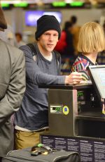 MIA WASIKOWSKA and Jesse Eisenberg Arrives at LAX Airport in Los Angeles