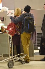 MIA WASIKOWSKA and Jesse Eisenberg Arrives at LAX Airport in Los Angeles