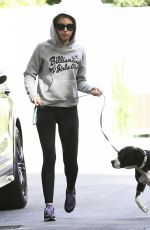 MILEY CYRUS Walks Her Dog Out in Los Angeles