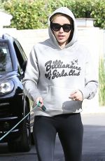 MILEY CYRUS Walks Her Dog Out in Los Angeles