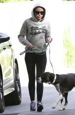 MILEY CYRUS Walks Her Dog Out in Los Angeles