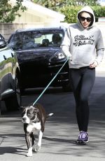 MILEY CYRUS Walks Her Dog Out in Los Angeles