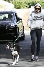 MILEY CYRUS Walks Her Dog Out in Los Angeles