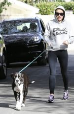MILEY CYRUS Walks Her Dog Out in Los Angeles