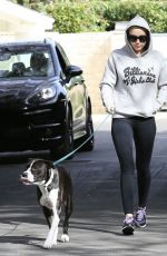 MILEY CYRUS Walks Her Dog Out in Los Angeles