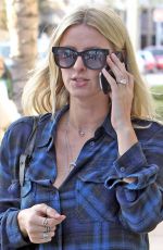NICKY HILTON Feeding a Parking Meter in Beverly Hills