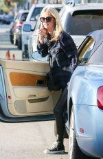 NICKY HILTON Feeding a Parking Meter in Beverly Hills
