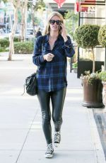 NICKY HILTON Feeding a Parking Meter in Beverly Hills