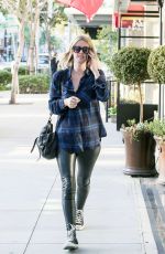 NICKY HILTON Feeding a Parking Meter in Beverly Hills