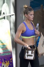 NINA AGDAL in Sport Bra and Leggings Riding a Bike Out in Miami