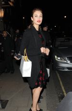 OLGA KURYLENKO at Dolce & Gabbana Christmas Tree Party in London