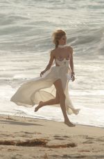 ROSIE HUNTINGTON-WHITELEY at a Photoshoot at a Beach in Malibu