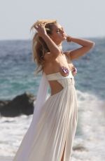 ROSIE HUNTINGTON-WHITELEY at a Photoshoot at a Beach in Malibu
