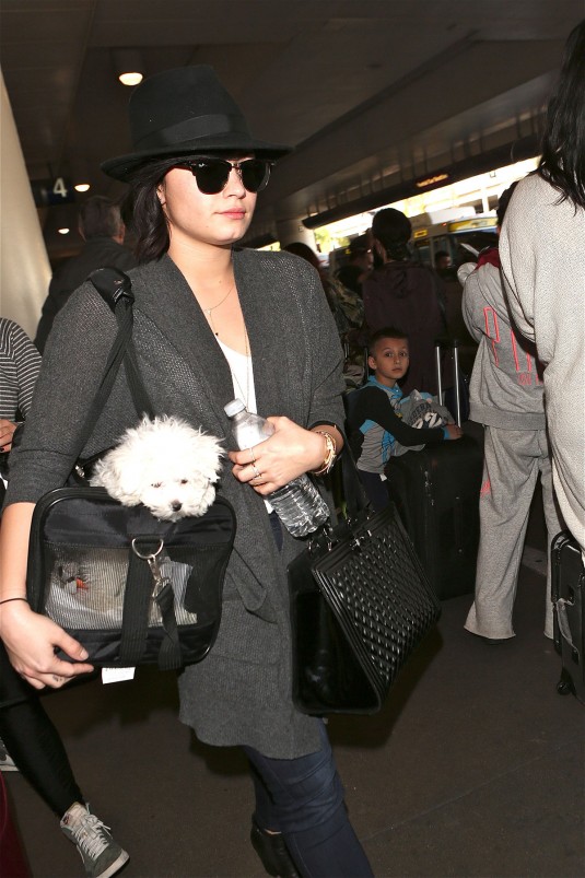 DEMI LOVATO at Los Angeles International Airport