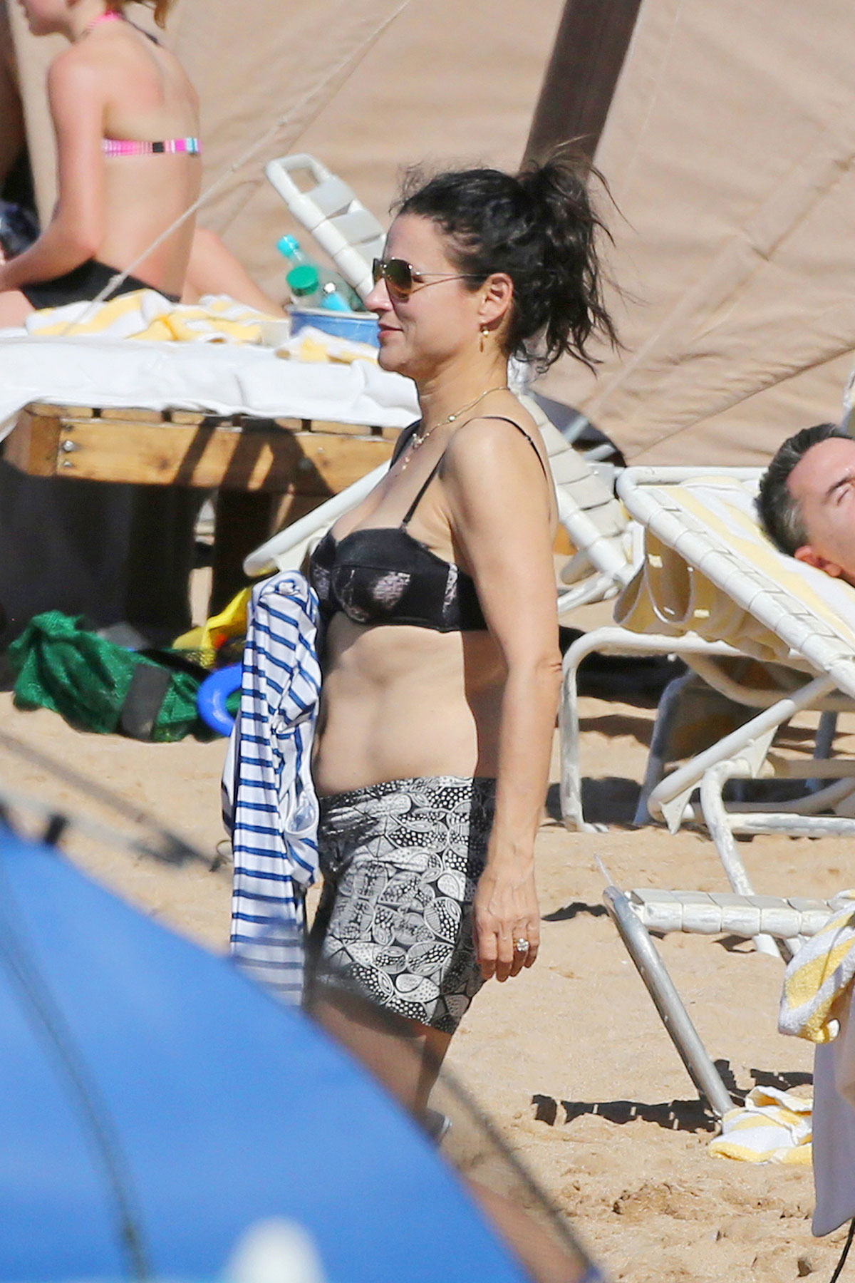 JULIA LOUIS-DREYFUS in Bikini Top at a Beach in Maui.