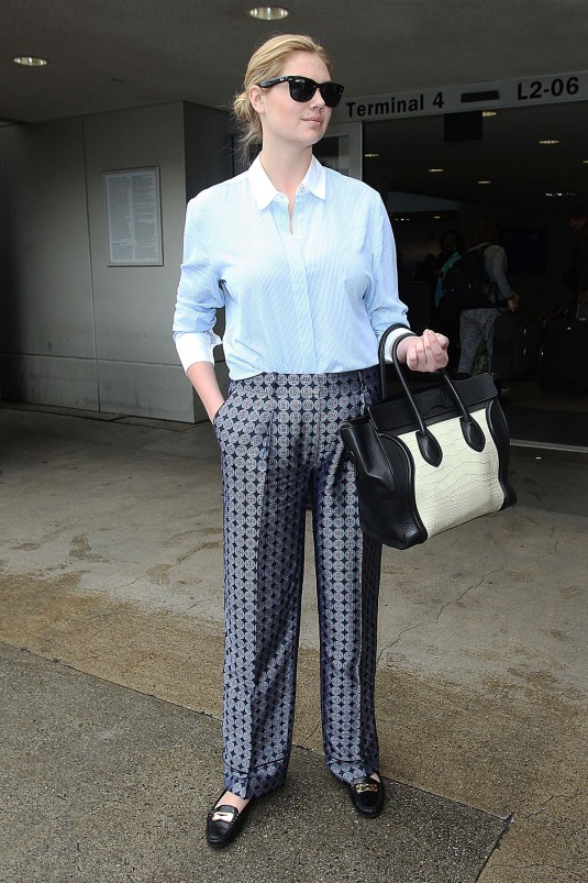 KATE UPTON at Los Angeles International Airport