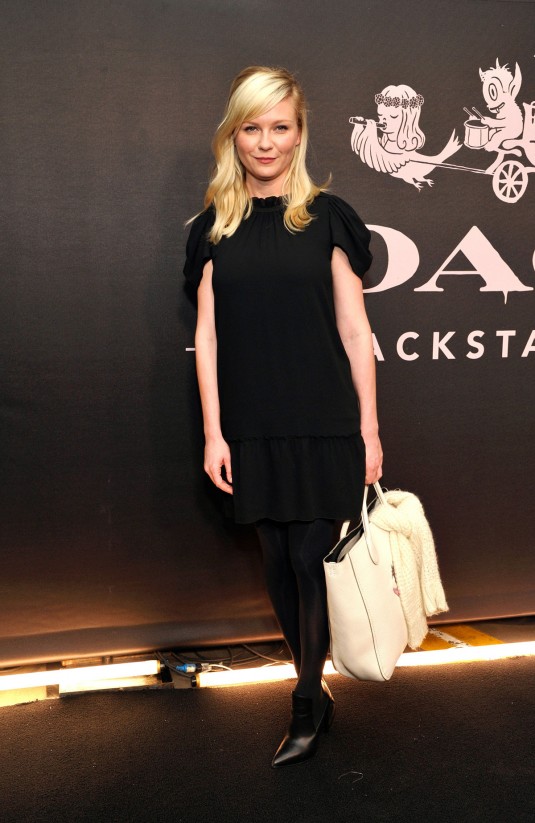 KIRSTEN DUNST at Coach Rodeo Drive Store Cocktail